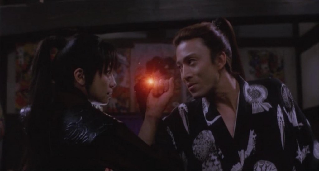 Rie Miyazawa and Somegorō Ichikawa in <em>Ashura</em> (2005)