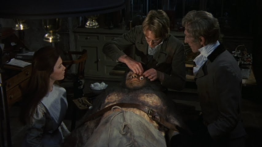 Madeline Smith, Shane Briant, David Prowse, and Peter Cushing in "Frankenstein and the Monster from Hell" (1974)