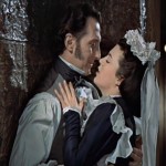 Baron Frankenstein (Peter Cushing) makes time with Justine (Valerie Gaunt) in "The Curse of Frankenstein" (1957)