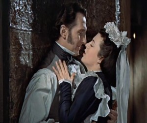 Baron Frankenstein (Peter Cushing) makes time with Justine (Valerie Gaunt) in "The Curse of Frankenstein" (1957)